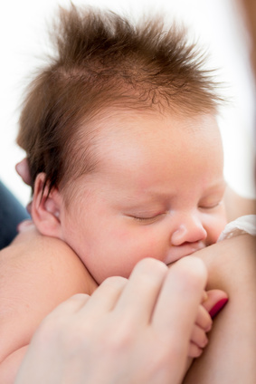 suckling infant baby girl