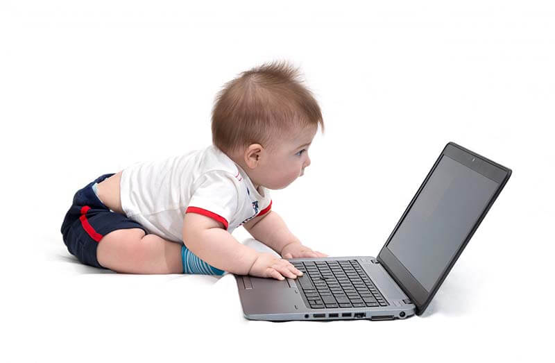baby working on computer